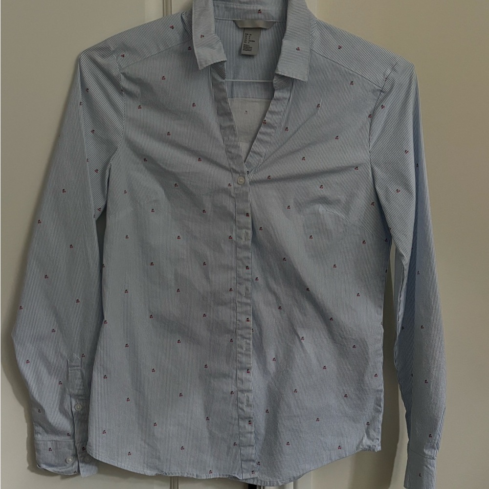 H&M women’s button up shirt, classic blue stripe with small cherry details.